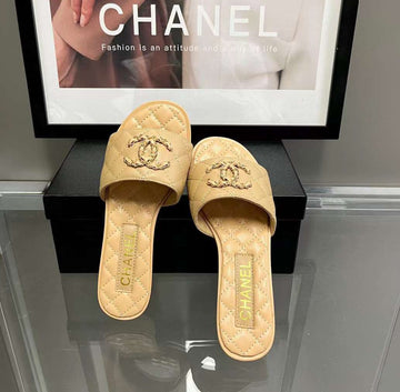 Chanel Quilted Slide Sandals – Elegant & Timeless