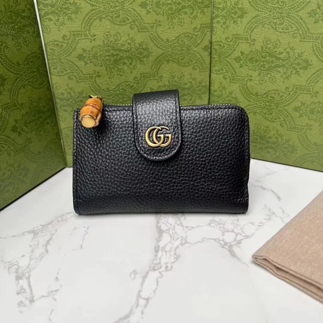 Gucci Leather Wallets in Black and Brown