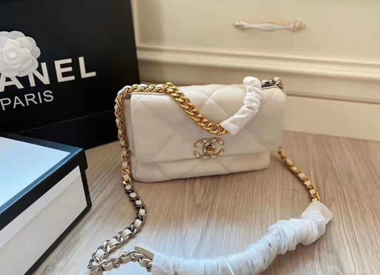 Pure Elegance – Chanel Classic Flap Bag in White