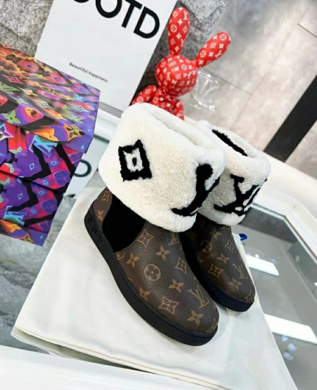 Luxurious Louis Vuitton Monogram Fur and Puffer Boots