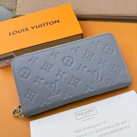 Louis Vuitton Embossed Monogram Zip Wallet